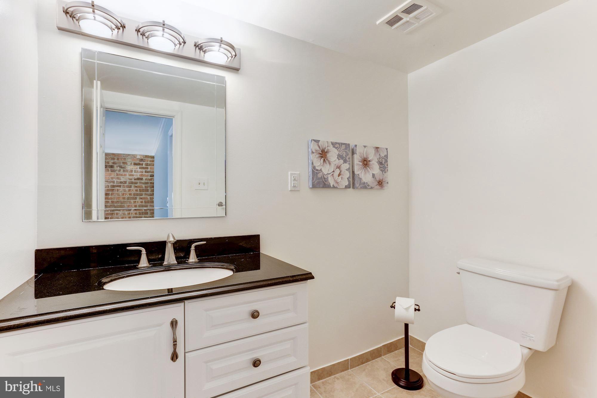 12335 Coleraine Court Reston, VA 20191 - Photo 51 of 84 Half Bathroom - Beautifully Upgraded & Spacious