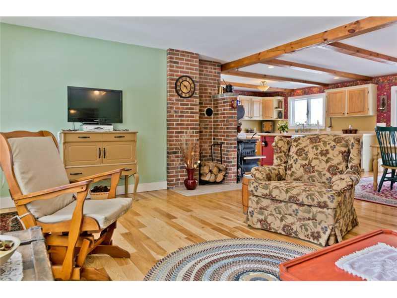 186 Hallowell Road Pownal, ME 04069 - Photo 14 of 25 Living Room. with wood stove hook up.