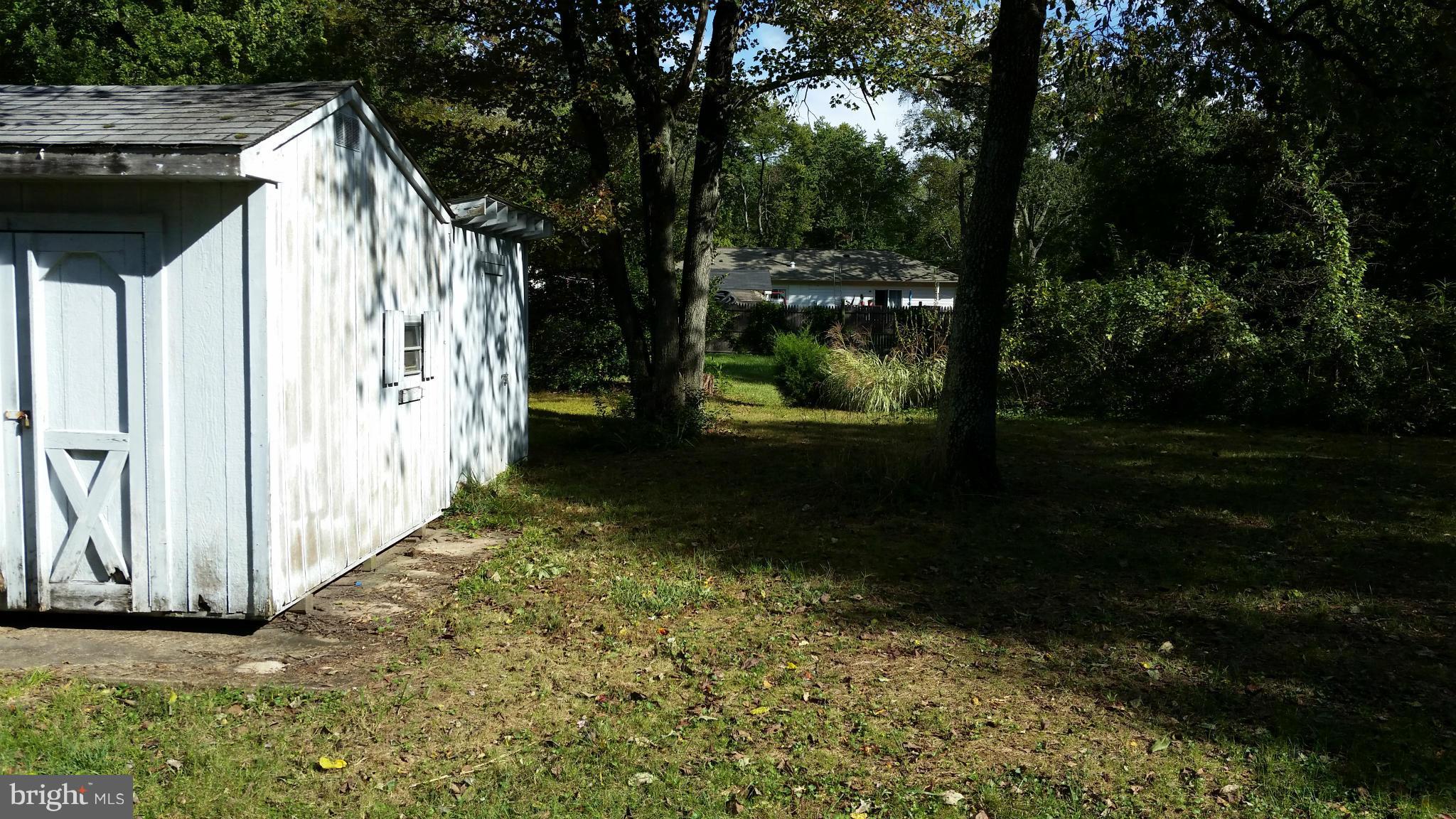 8705 Crest Road Severn, MD 21144 - Photo 2 of 13 Rear yard and large shed