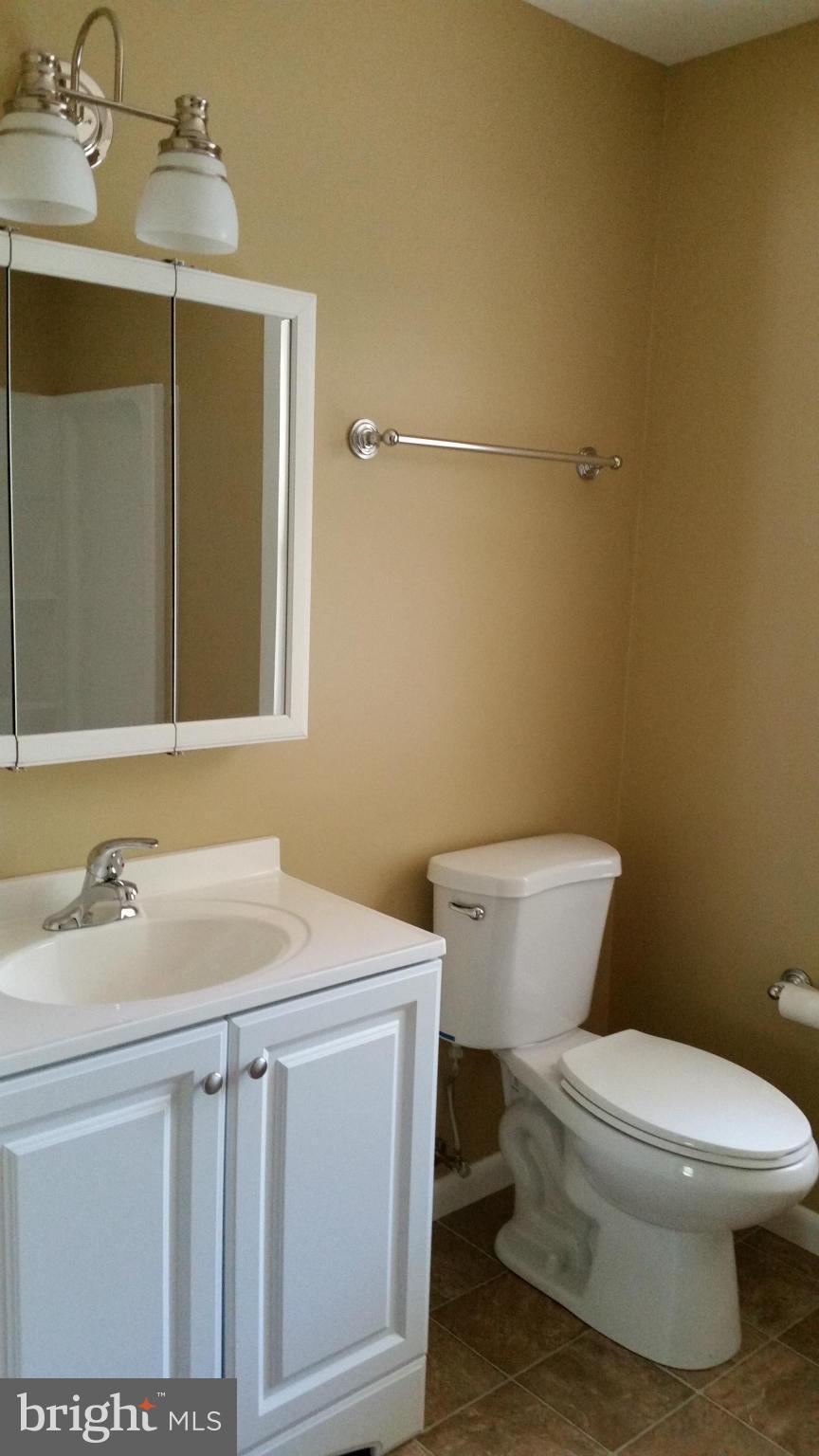 8705 Crest Road Severn, MD 21144 - Photo 8 of 13 Second bath with walk in shower