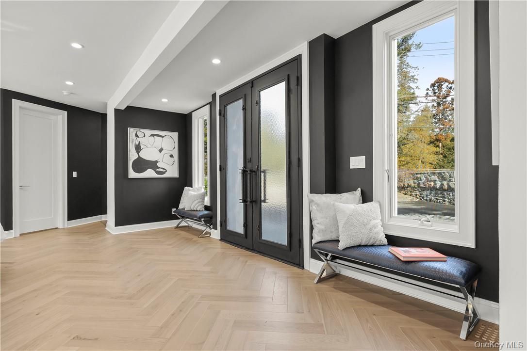 343 Purchase Street Rye, NY 10580 - Photo 3 of 36 a living room with furniture and a large window