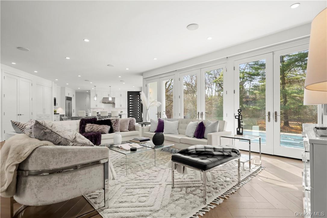 343 Purchase Street Rye, NY 10580 - Photo 4 of 36 a living room with furniture large windows and wooden floor