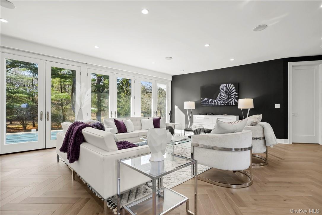 343 Purchase Street Rye, NY 10580 - Photo 6 of 36 a living room with furniture and a large window