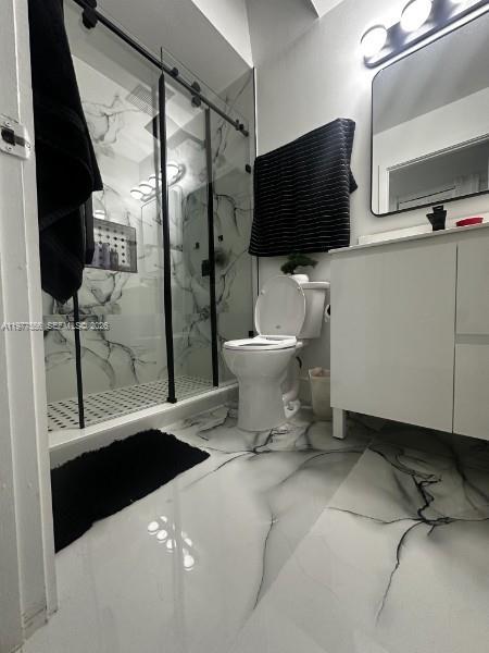 14952 Southwest 75th Terrace Miami, FL 33193 - Photo 11 of 16 a bathroom with a sink toilet and shower