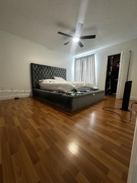 14952 Southwest 75th Terrace Miami, FL 33193 - Photo 12 of 16 a living room with couch
