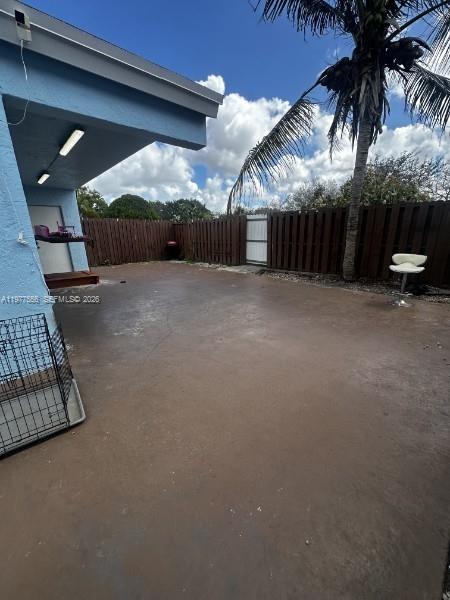 14952 Southwest 75th Terrace Miami, FL 33193 - Photo 14 of 16 a view of a house with a yard