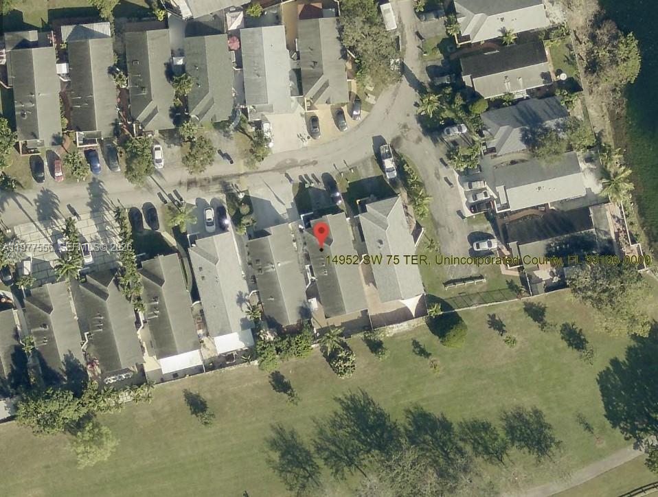 14952 Southwest 75th Terrace Miami, FL 33193 - Photo 16 of 16 an aerial view of residential house with parking