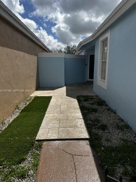 14952 Southwest 75th Terrace Miami, FL 33193 - Photo 3 of 16 a view of a backyard of the house