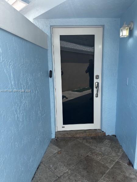 14952 Southwest 75th Terrace Miami, FL 33193 - Photo 4 of 16 a view of front door