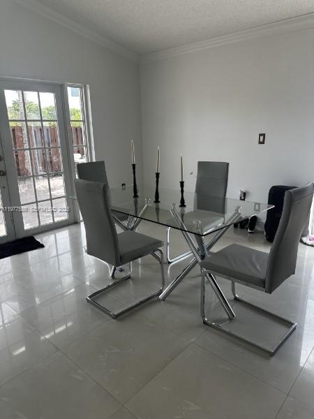 14952 Southwest 75th Terrace Miami, FL 33193 - Photo 7 of 16 a work room with furniture and window