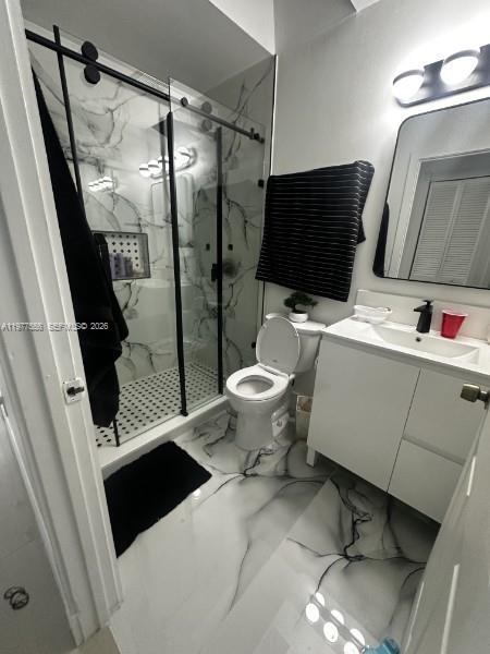 14952 Southwest 75th Terrace Miami, FL 33193 - Photo 10 of 16 a bathroom with a sink toilet and shower
