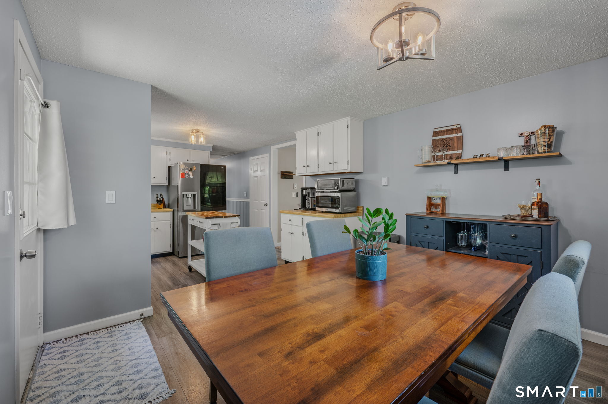 6 Amherst Court Groton, CT 06355 - Photo 14 of 40 a kitchen with a table and chairs in it