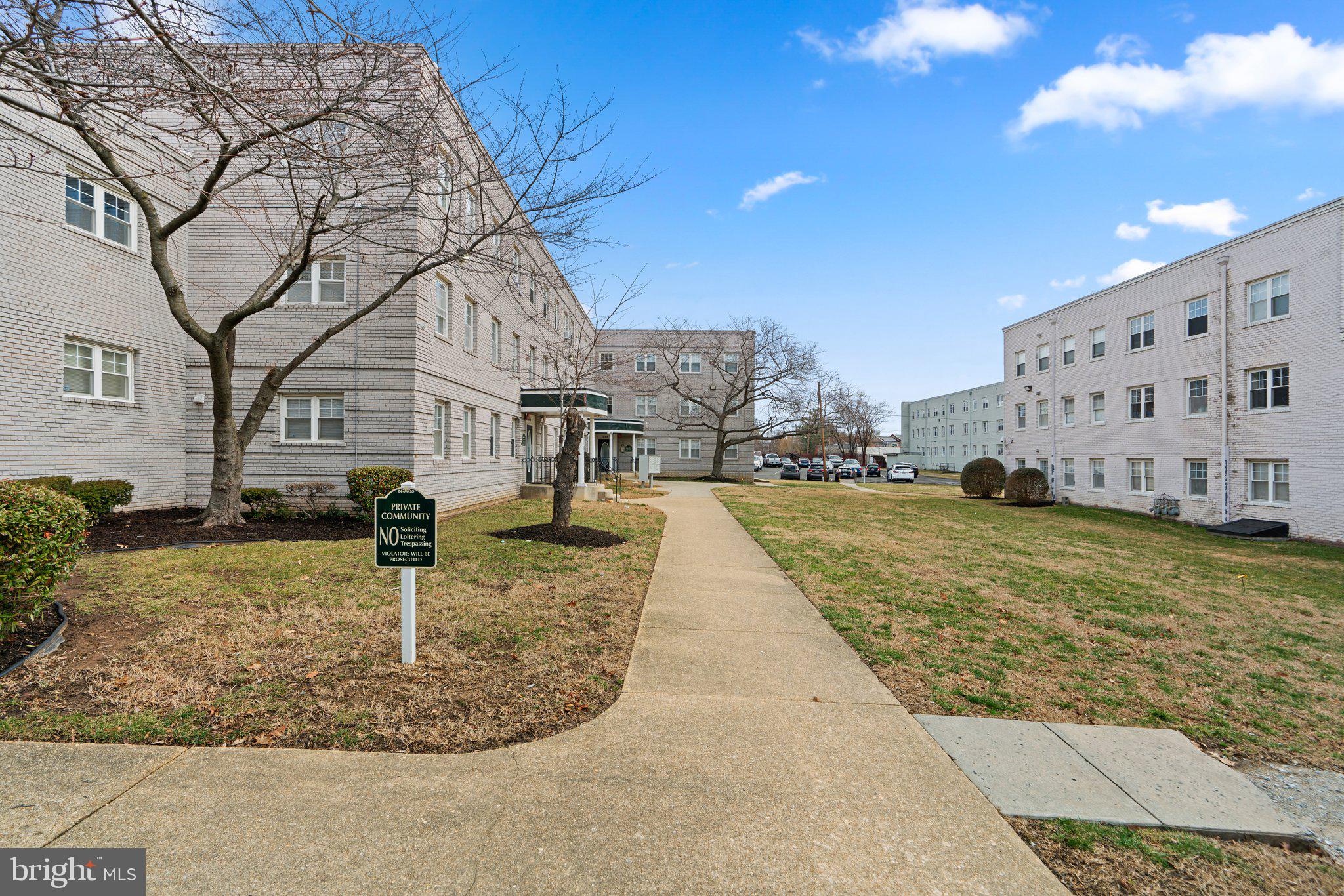 3866 9th Street Southeast, Unit 101 Washington, DC 20032 - Photo 22 of 24 a view of a house with a yard