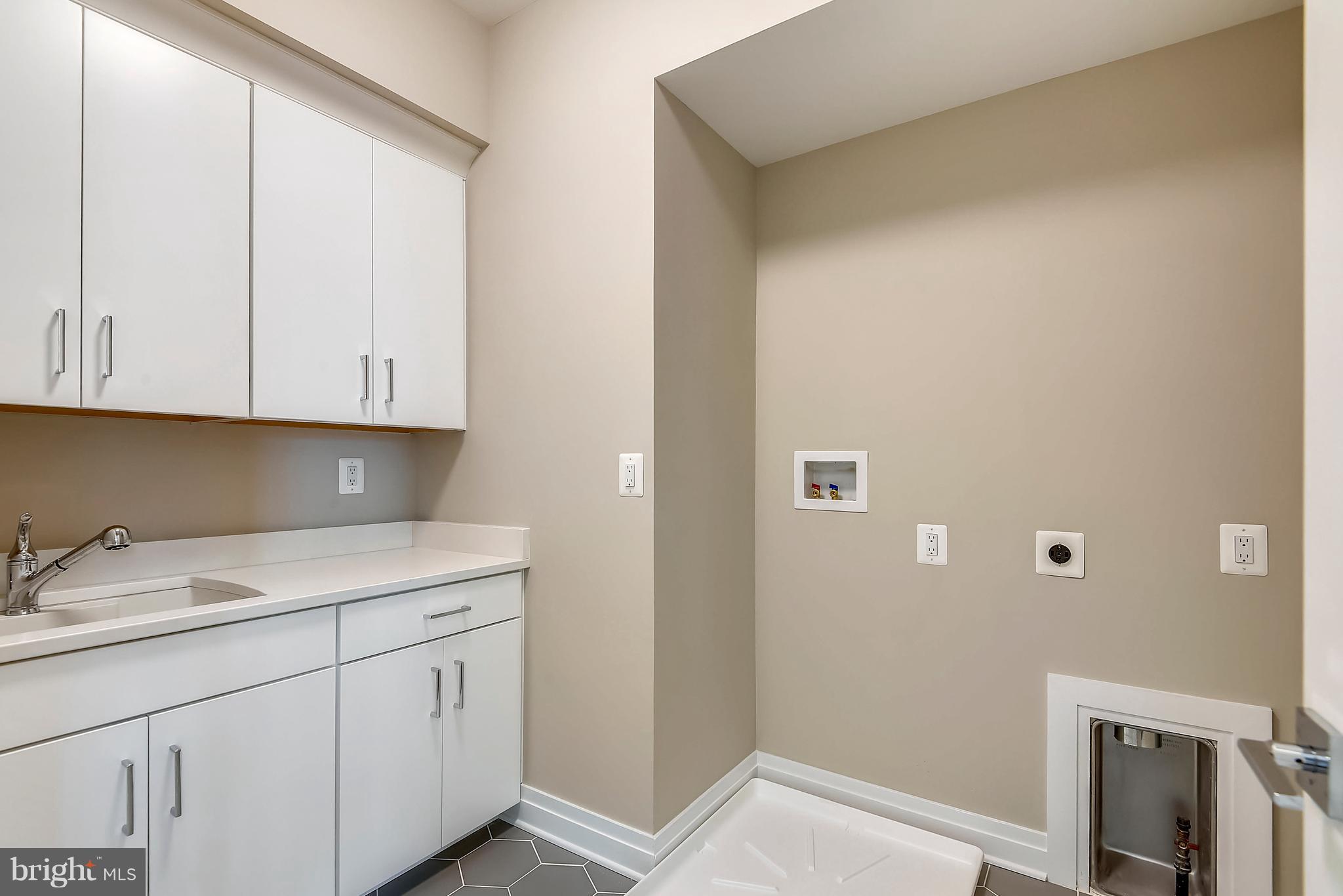 7204 Marbury Road Bethesda, MD 20817 - Photo 45 of 58 Upper Level Laundry Room