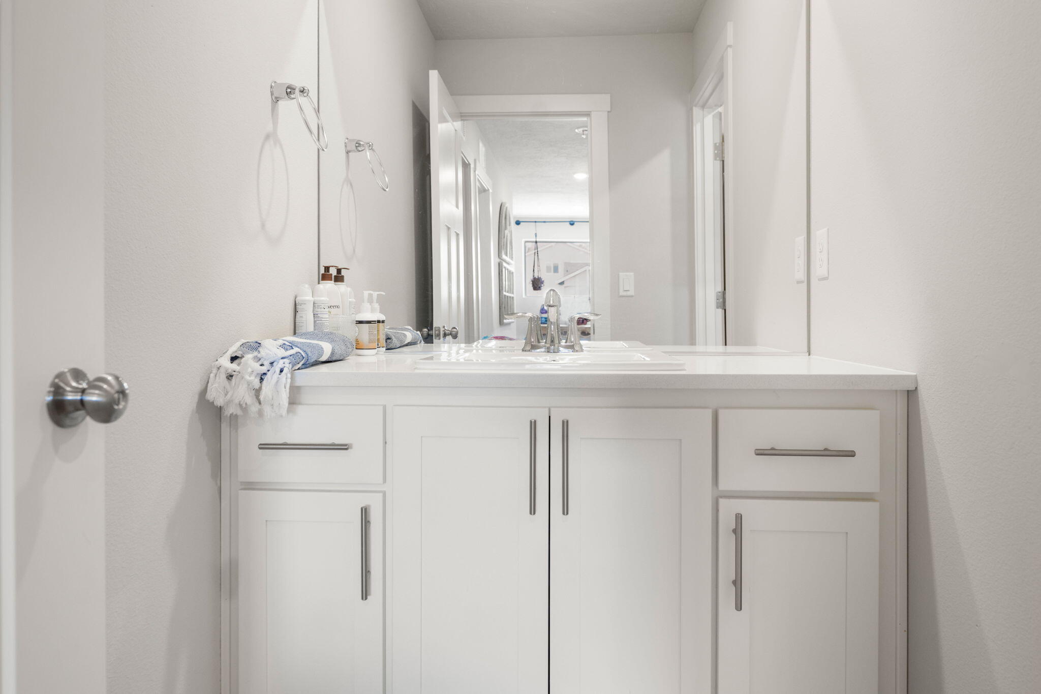 4039 Southwest Quartz Place Redmond, OR 97756 - Photo 29 of 44 a bathroom with a sink vanity and a mirror