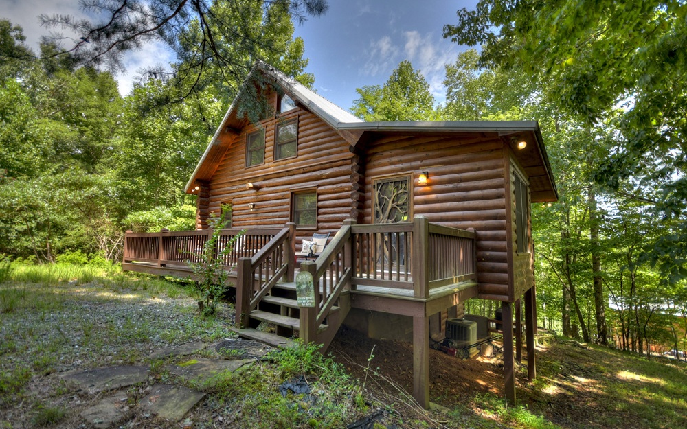 287 Lakeview Drive Blue Ridge, GA 30513 - Photo 1 of 1 a front view of a house with garden
