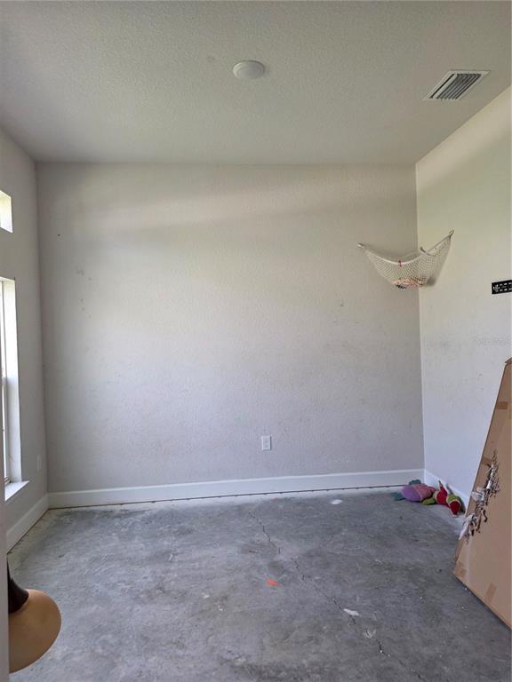 9 Cedar Run Ocala, FL 34472 - Photo 13 of 15 a view of a room with closet and wooden floor
