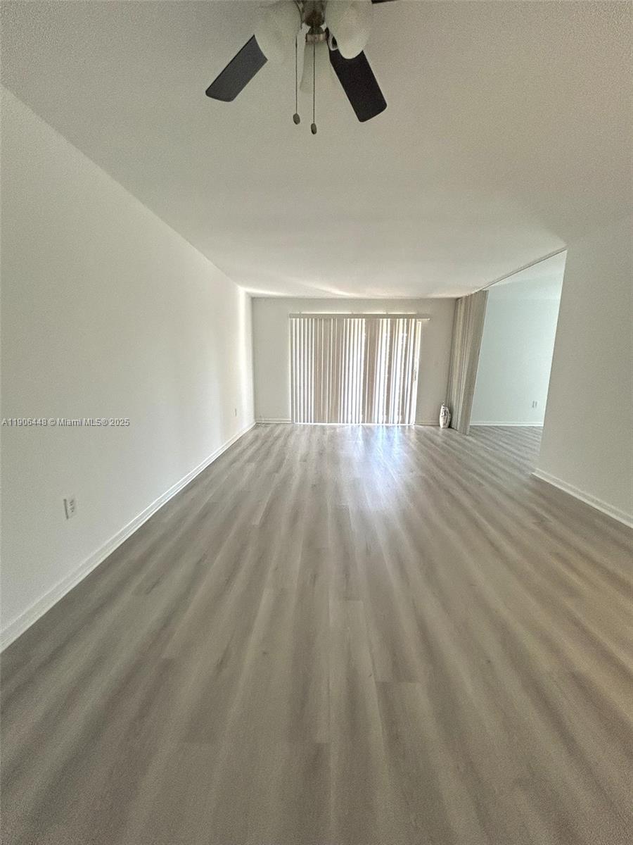 11905 Northeast 2nd Avenue, Unit C402 North Miami, FL 33161 - Photo 3 of 18 a view of an empty room with a window