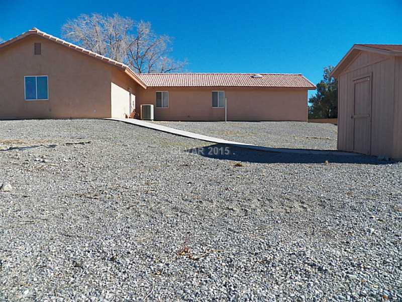 5891 Grain Mill Road Pahrump, NV 89061 - Photo 32 of 35 Property Photo. Storage Shed with Walkway!