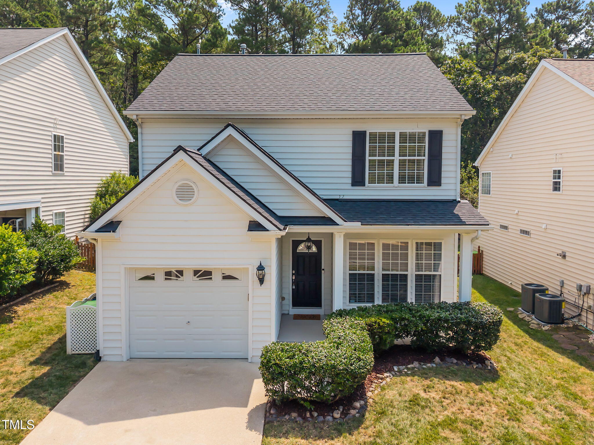 8404 Stone Mason Drive Raleigh, NC 27613 - Photo 1 of 42 1-web-or-mls-DJI_20250709115150_0635_D