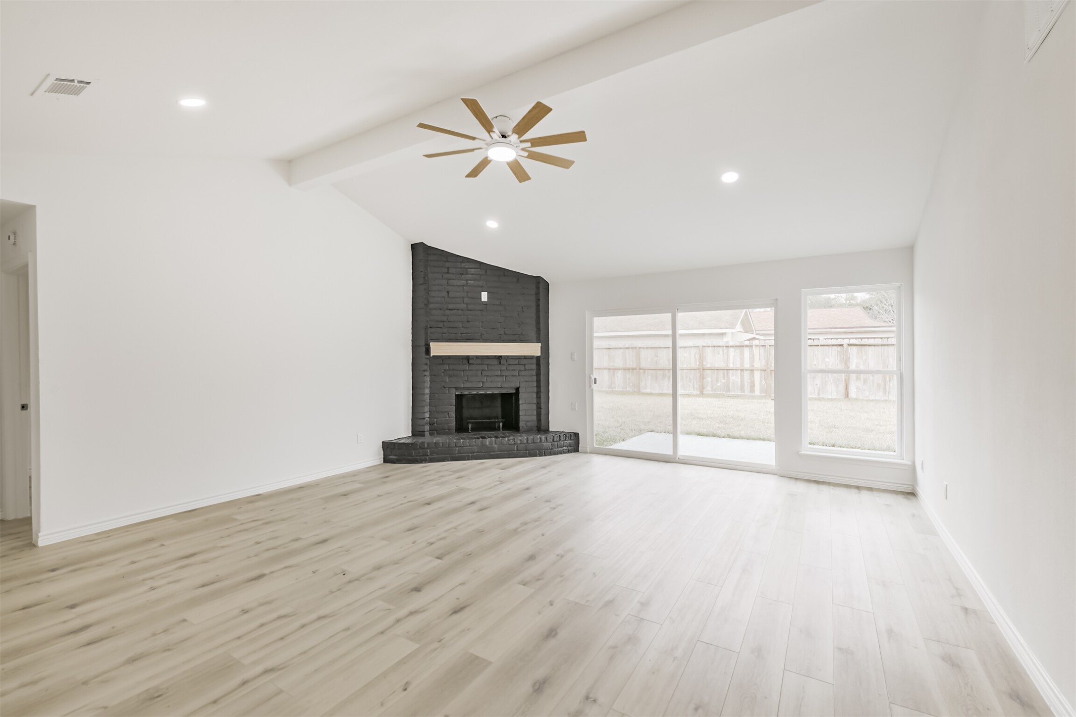 4215 Rosegate Drive Spring, TX 77373 - Photo 11 of 38 The exterior and interior entertainment areas are separated with a new 8' sliding door with tempered glass.