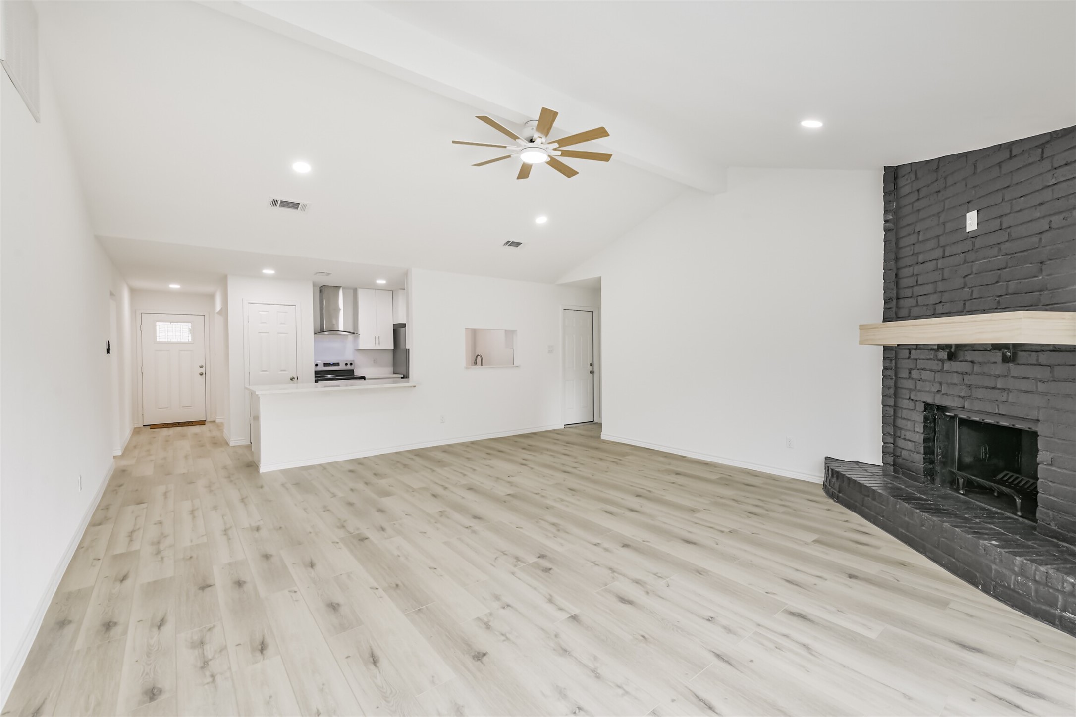 4215 Rosegate Drive Spring, TX 77373 - Photo 12 of 38 The kitchen flows seamlessly with the living area.
