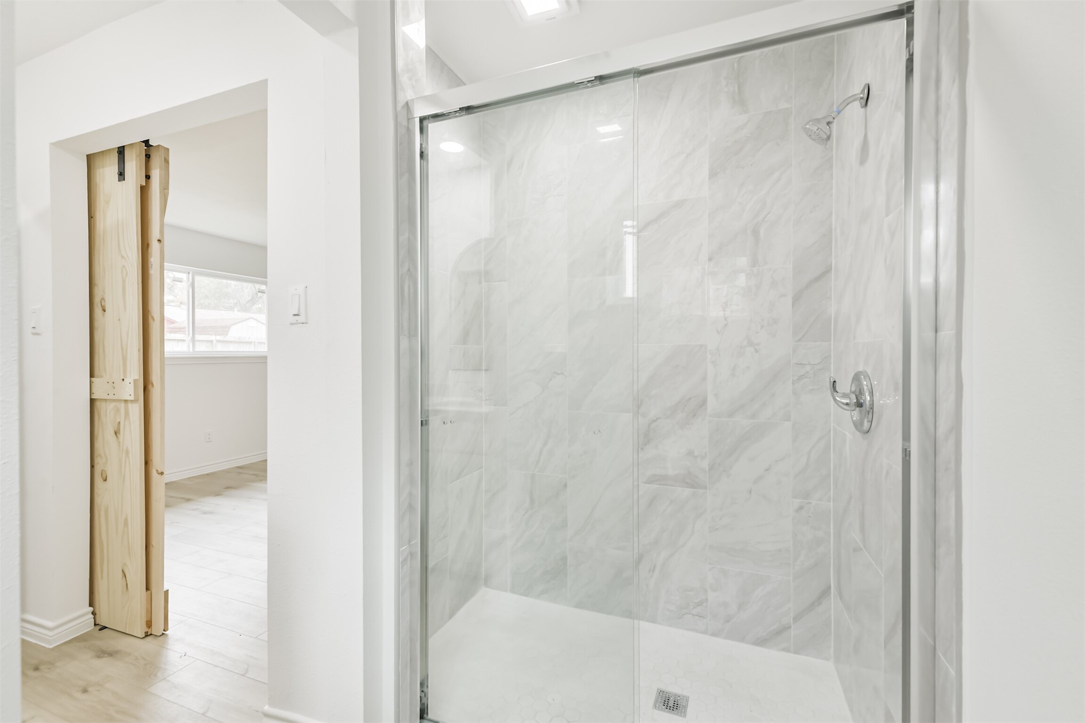 4215 Rosegate Drive Spring, TX 77373 - Photo 25 of 38 Step into this enlarged shower with full tile surround. New drains were added for the shower and toilet.
