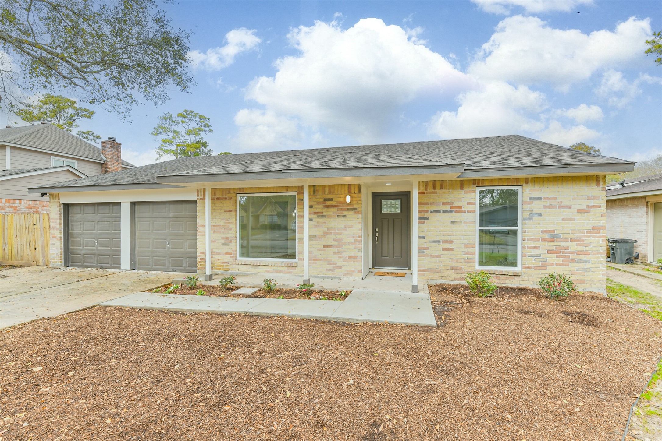4215 Rosegate Drive Spring, TX 77373 - Photo 3 of 38 The curb appeal has been completely revamped with a brand-new sidewalk, mulch, and plants.
