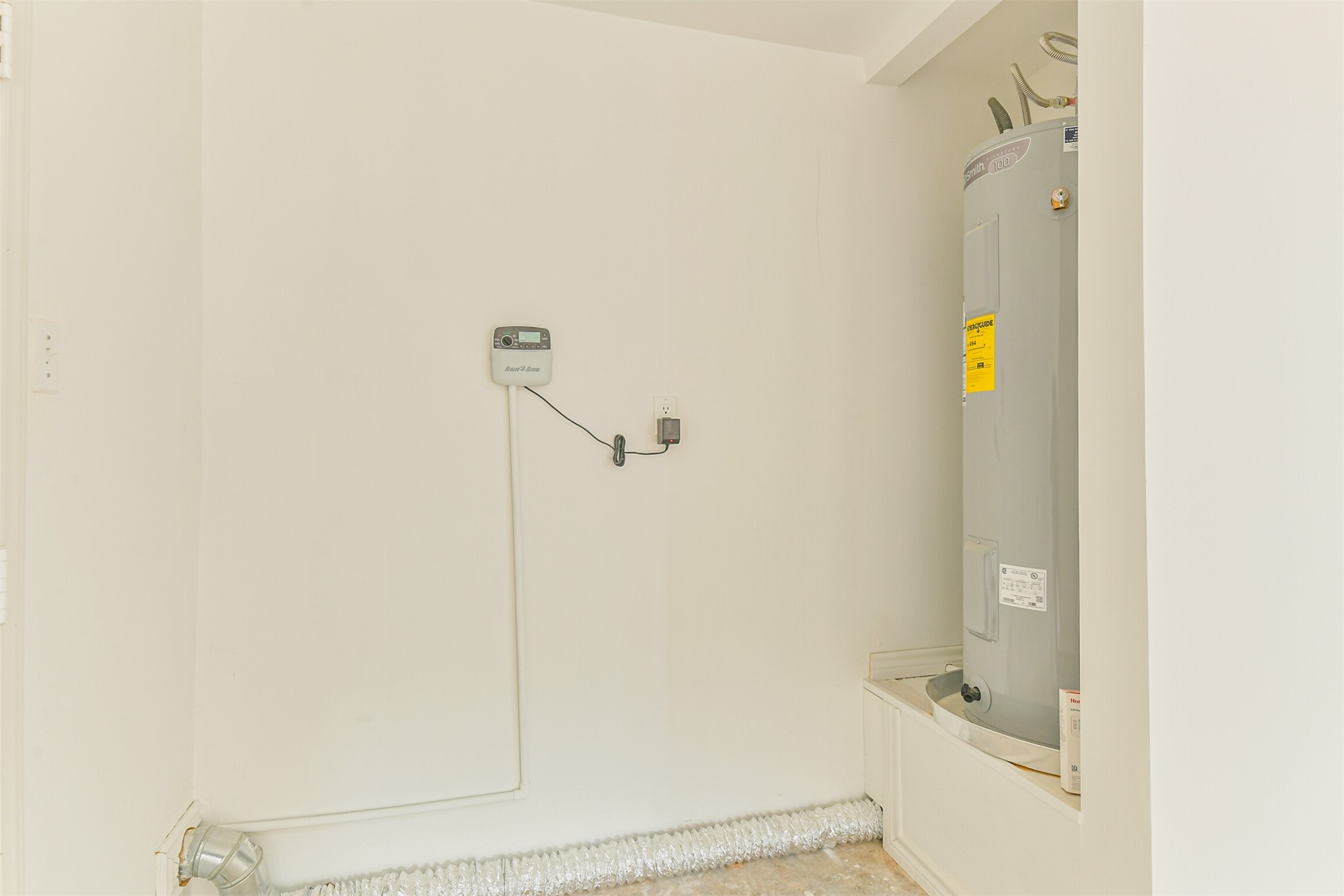 4215 Rosegate Drive Spring, TX 77373 - Photo 35 of 38 In the garage you'll also find a new Rainbird sprinkler system, and new high efficiency water heater.