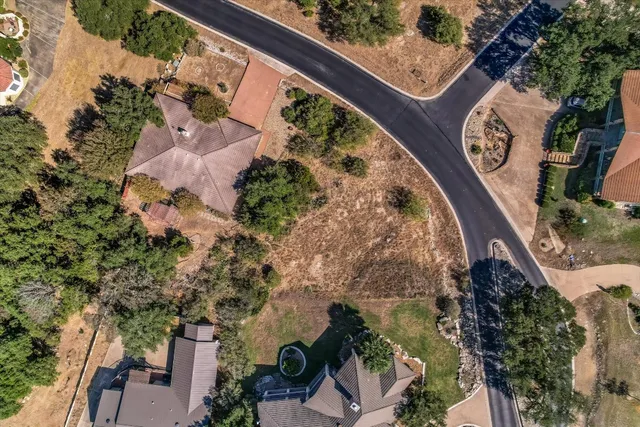 an aerial view of a house with a outdoor space