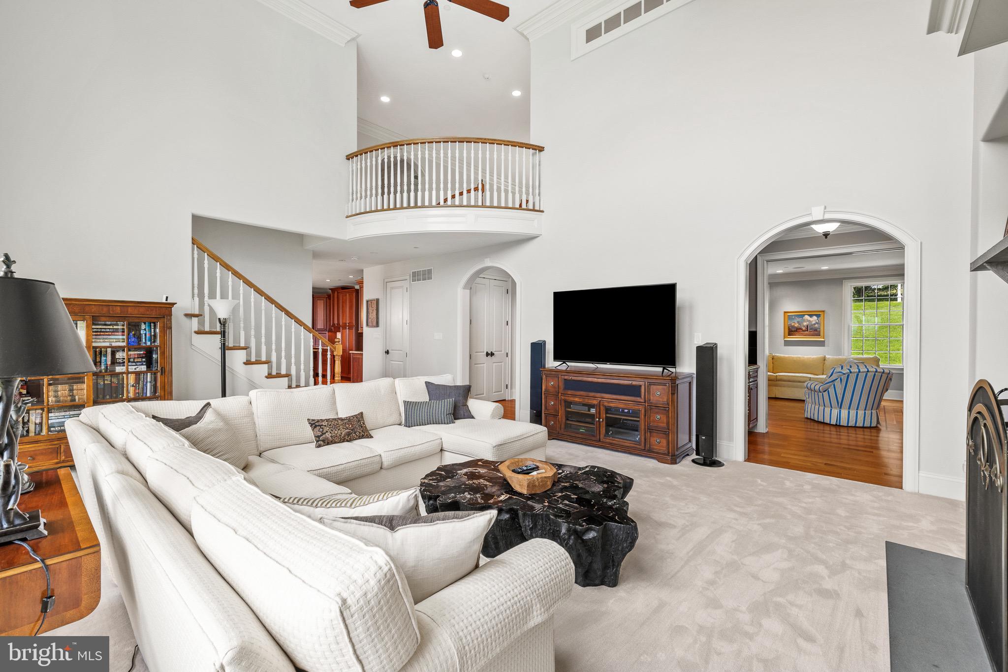5835 Ridgeview Drive Doylestown, PA 18902 - Photo 13 of 63 a living room with furniture and a flat screen tv