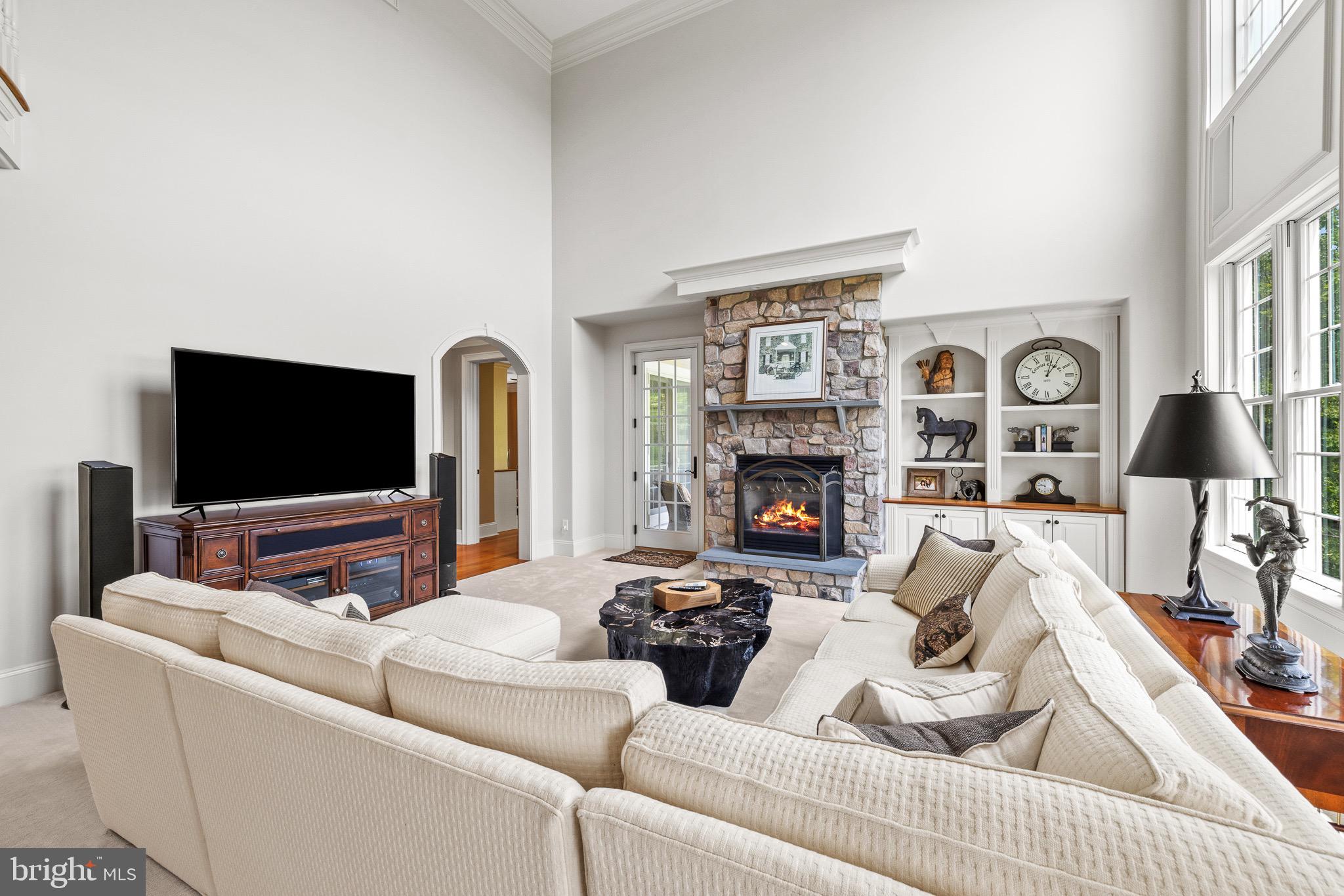 5835 Ridgeview Drive Doylestown, PA 18902 - Photo 14 of 63 a living room with furniture and a flat screen tv