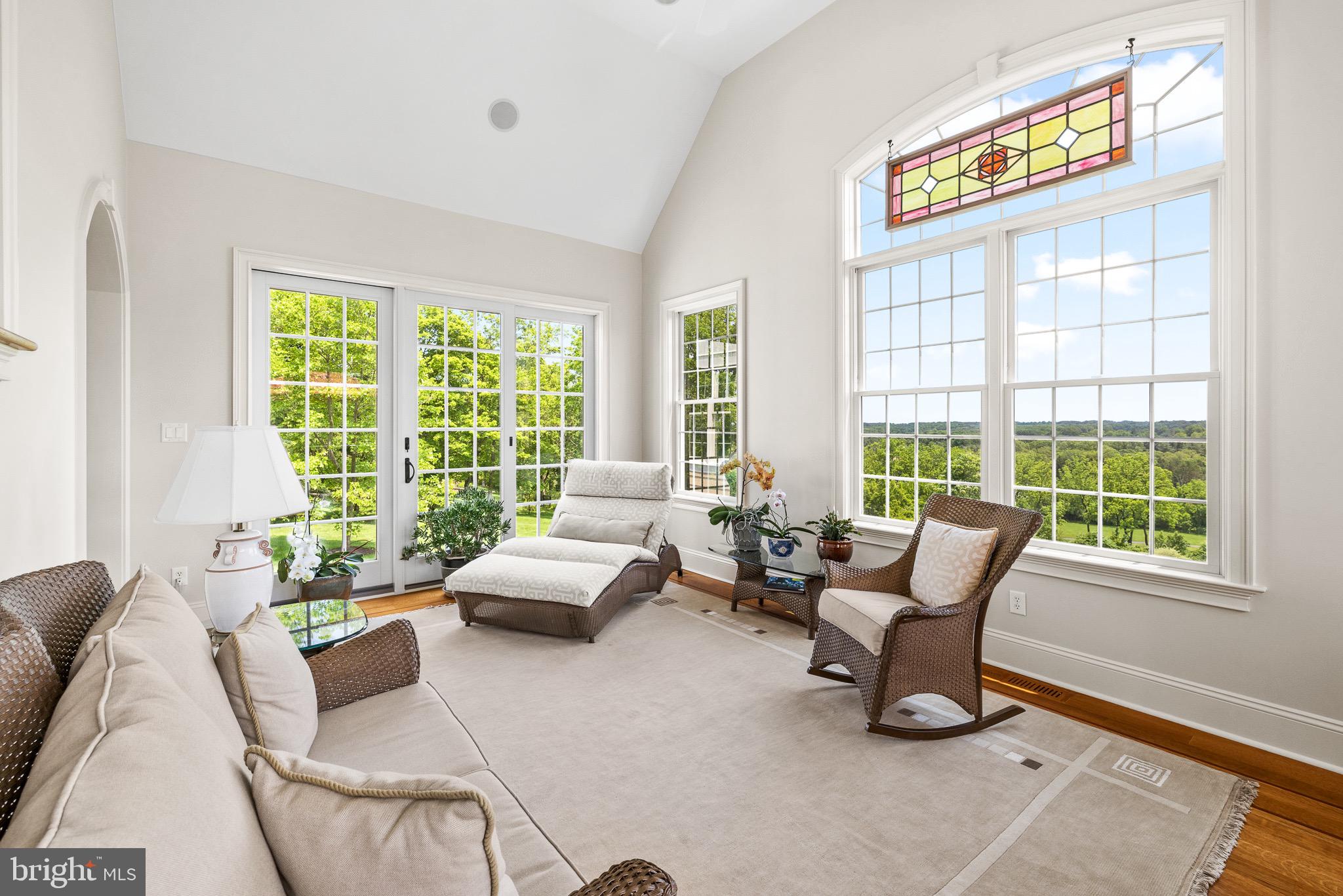 5835 Ridgeview Drive Doylestown, PA 18902 - Photo 19 of 63 a living room with furniture and floor to ceiling windows