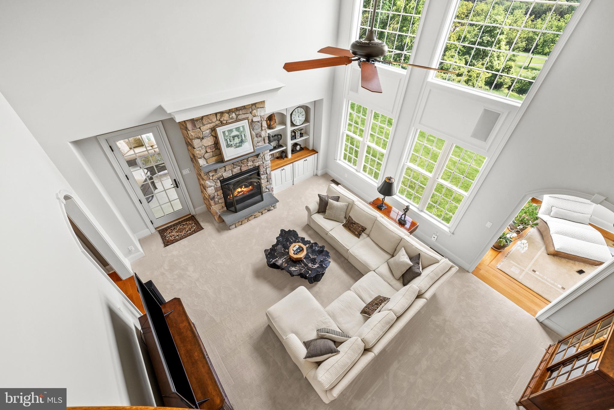 5835 Ridgeview Drive Doylestown, PA 18902 - Photo 36 of 63 a living room with furniture and a large window