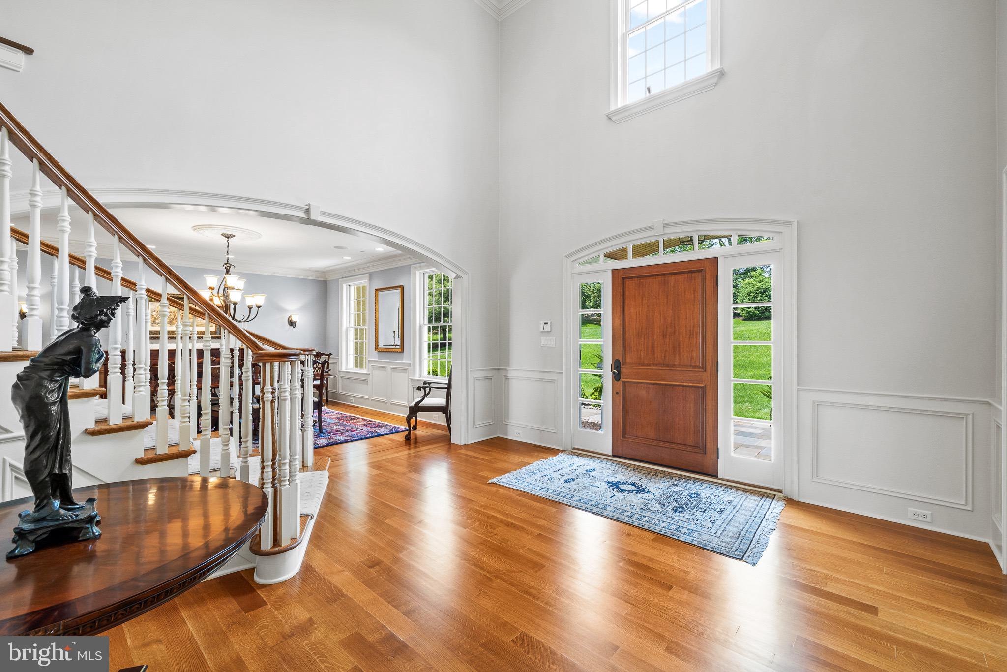 5835 Ridgeview Drive Doylestown, PA 18902 - Photo 7 of 63 a view of an entryway with wooden floor and door