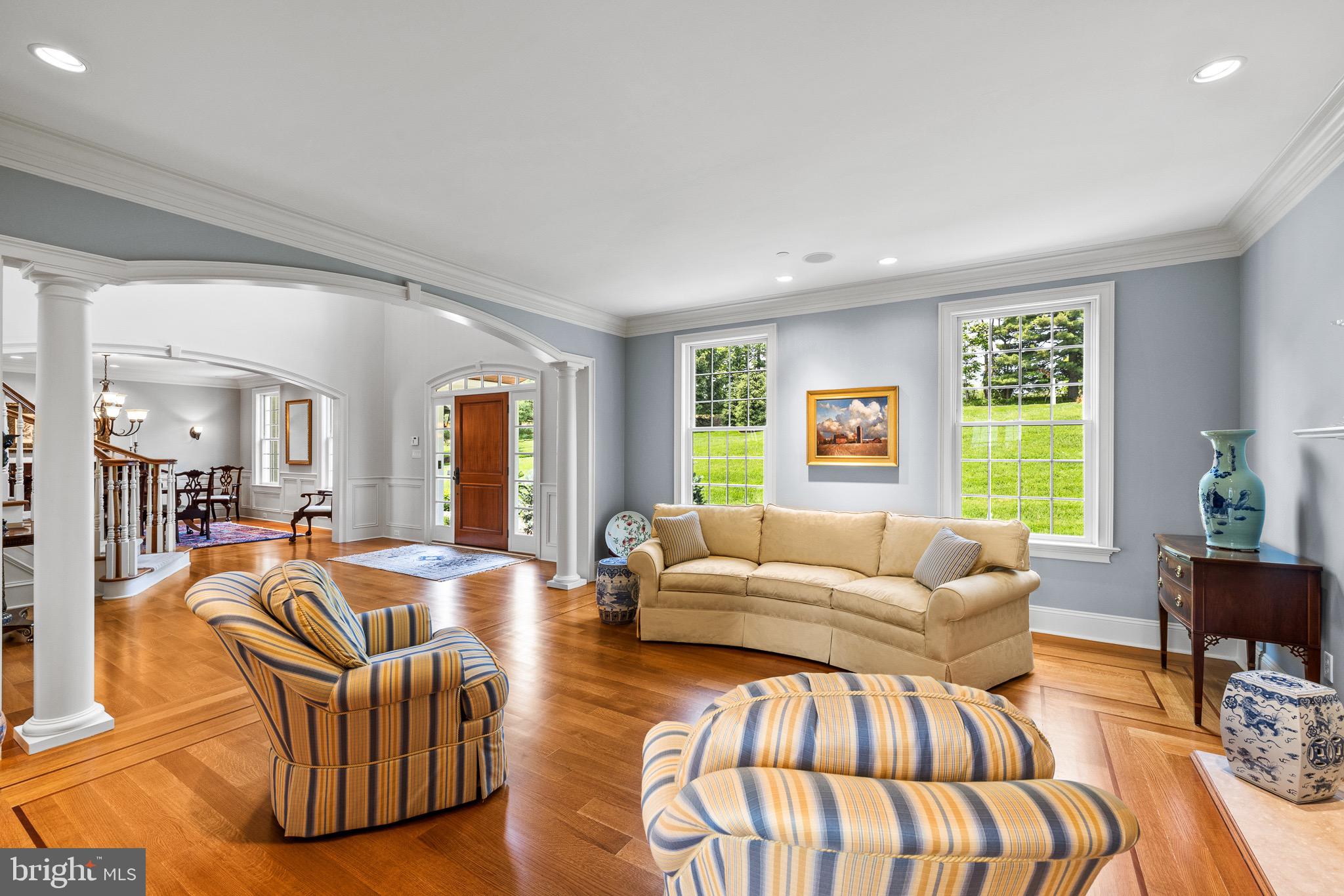 5835 Ridgeview Drive Doylestown, PA 18902 - Photo 9 of 63 a living room with furniture wooden floor and a large window
