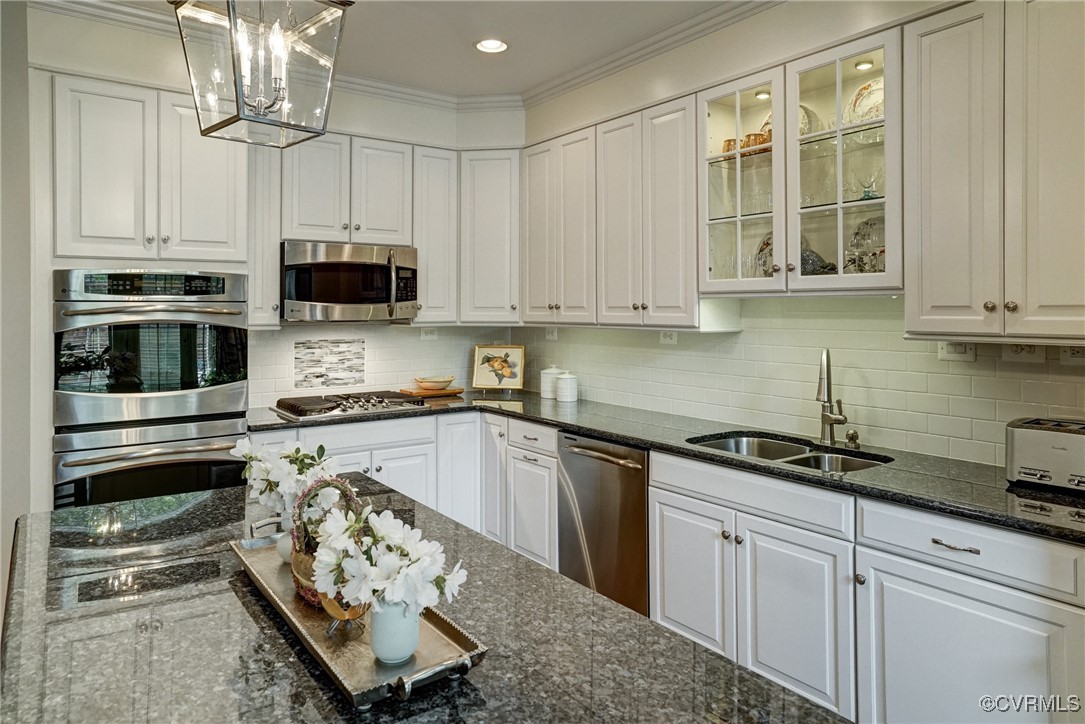 709 Chiswick Park Road Henrico, VA 23229 - Photo 16 of 47 Kitchen featuring white cabinets, stainless steel