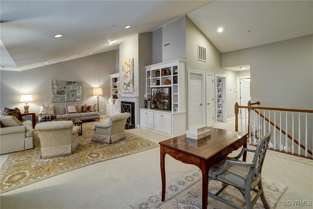 709 Chiswick Park Road Henrico, VA 23229 - Photo 32 of 47 Living area with light colored carpet, high vaulte