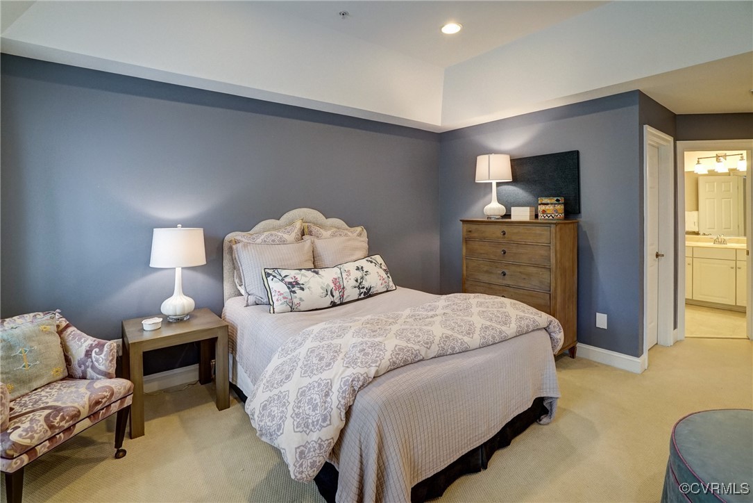 709 Chiswick Park Road Henrico, VA 23229 - Photo 39 of 47 Bedroom with light colored carpet, ensuite bath, a