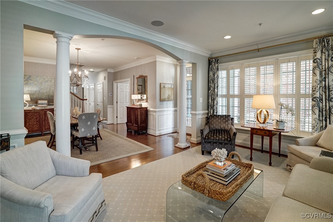 709 Chiswick Park Road Henrico, VA 23229 - Photo 8 of 47 Living room featuring decorative columns, wood fin