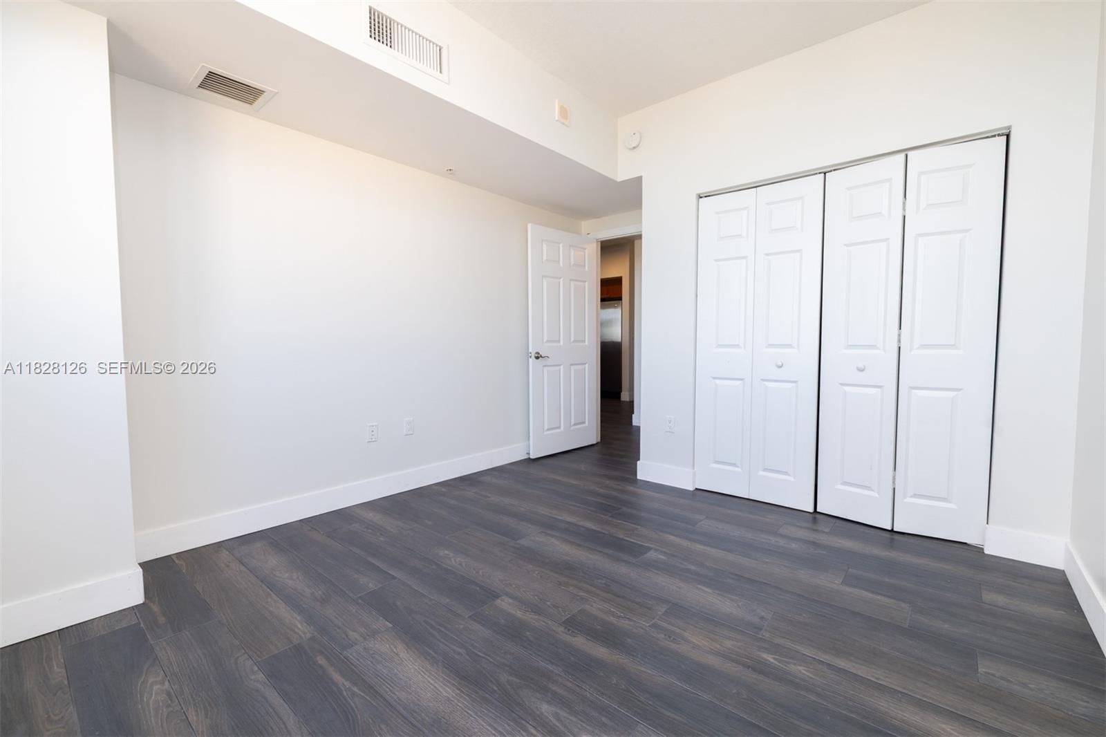 888 Douglas Road, Unit PH07 Coral Gables, FL 33134 - Photo 16 of 30 Guest Bedroom