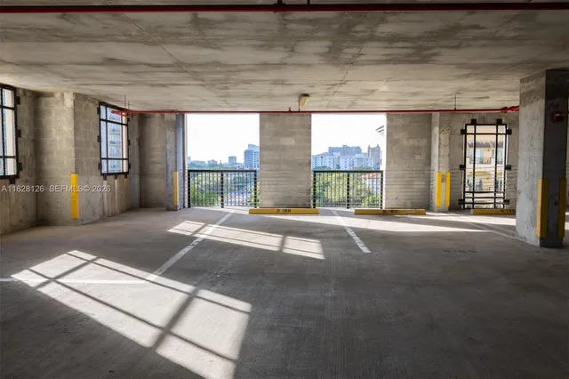 a living room with furniture a rug and a flat screen tv