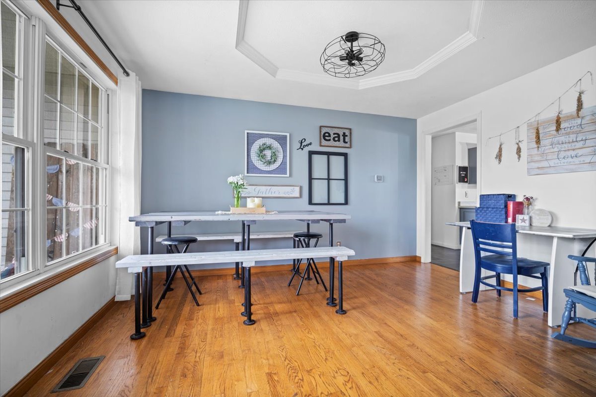 1318 Shannon Road Normal, IL 61761 - Photo 29 of 40 a view of a workspace with furniture window and wooden floor