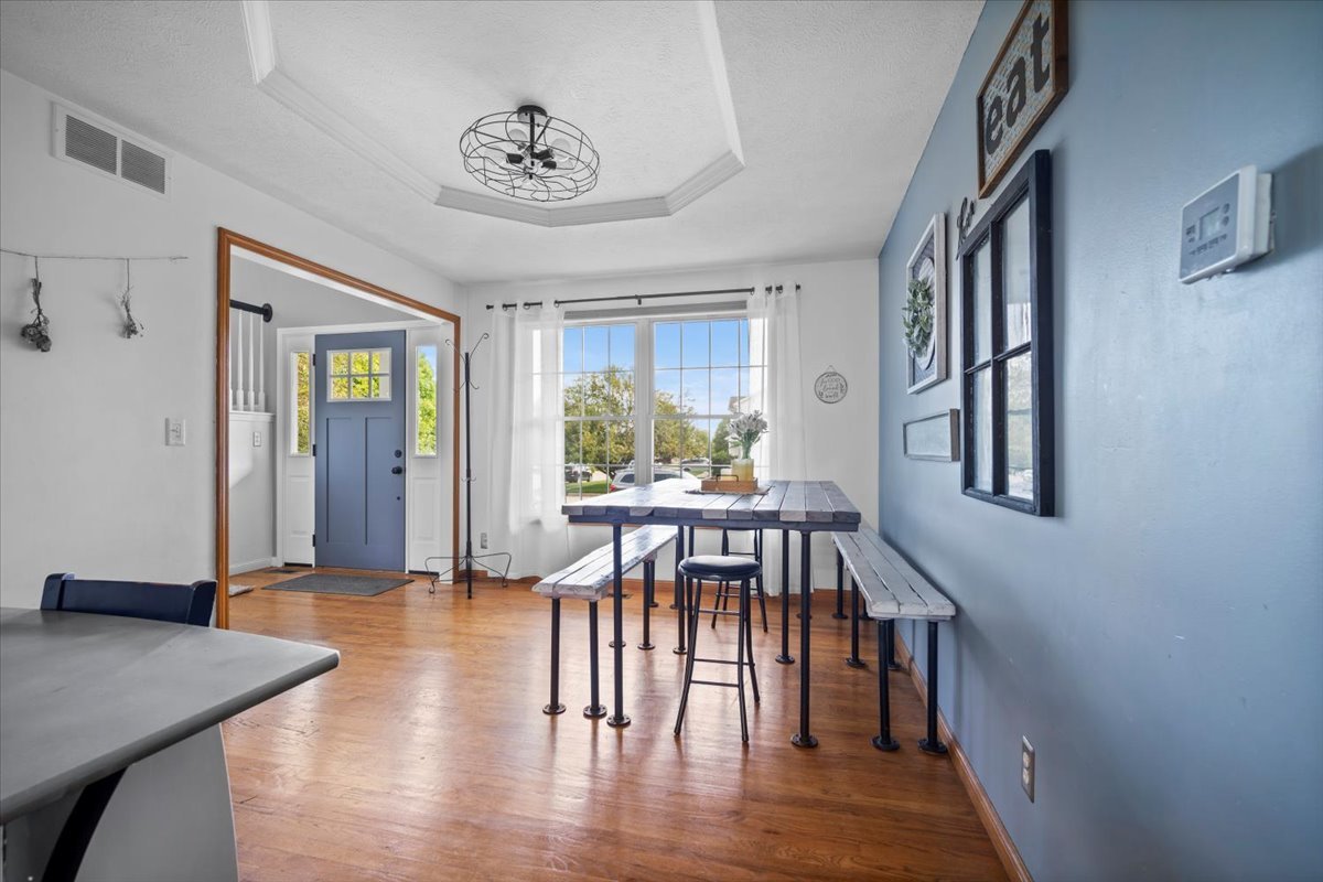 1318 Shannon Road Normal, IL 61761 - Photo 30 of 40 a view of a dining room with furniture and window