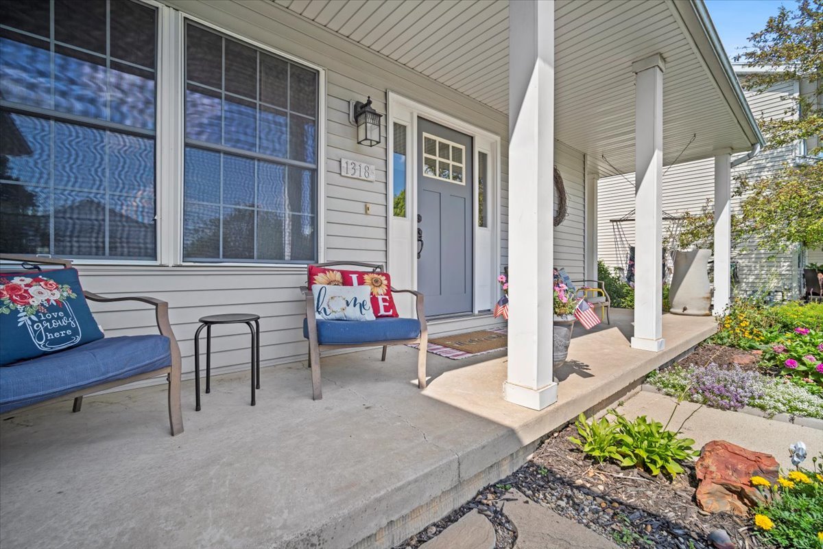 1318 Shannon Road Normal, IL 61761 - Photo 3 of 40 a outdoor space with patio the couches and a potted plant on a table