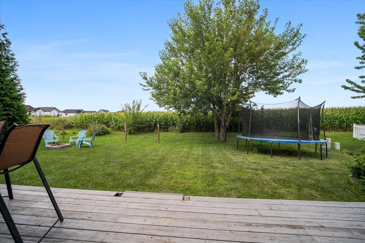 1318 Shannon Road Normal, IL 61761 - Photo 32 of 40 a view of a garden with a bench
