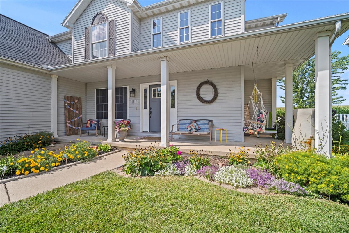 1318 Shannon Road Normal, IL 61761 - Photo 40 of 40 a front view of a house with a yard and outdoor seating