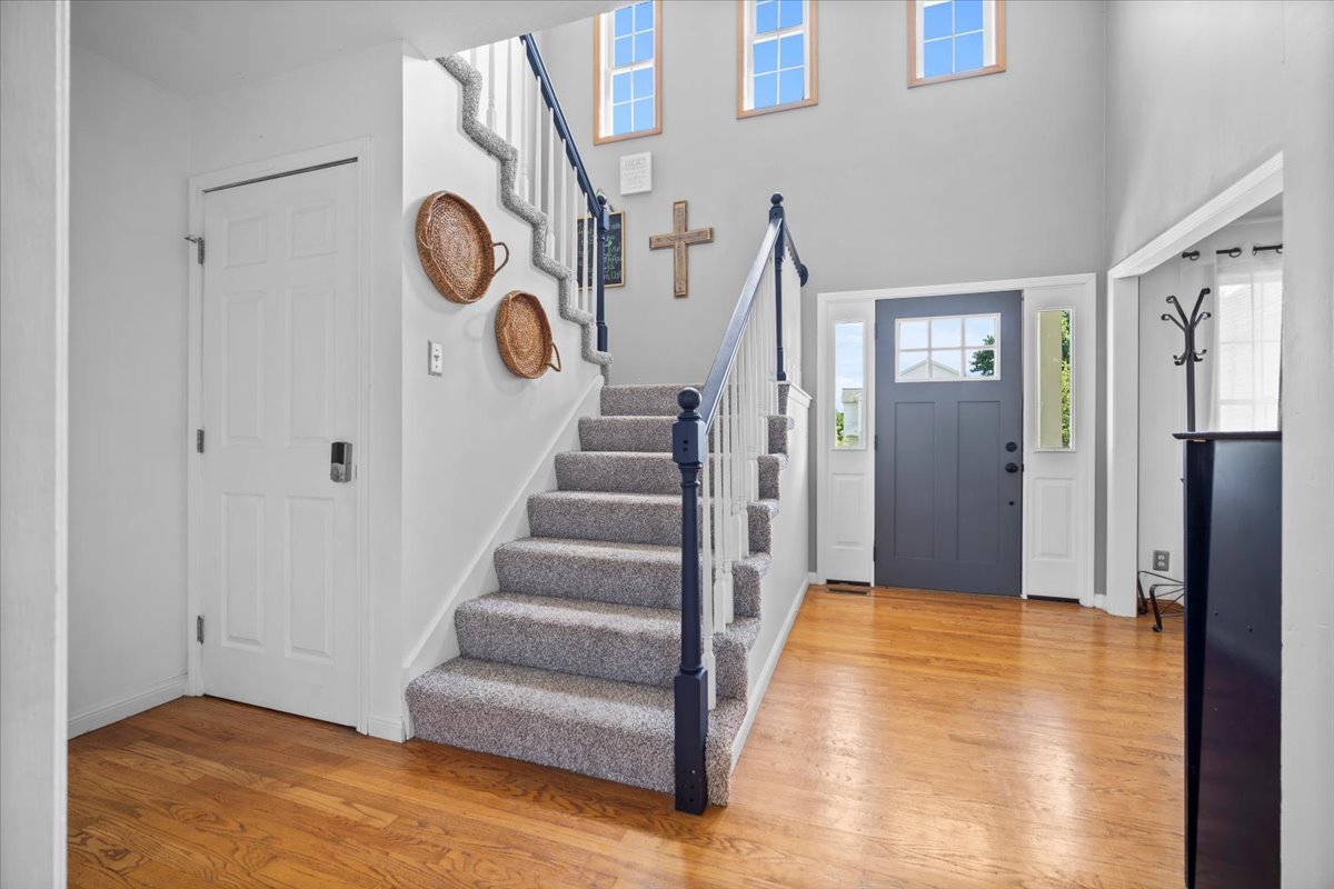 1318 Shannon Road Normal, IL 61761 - Photo 5 of 40 a view of an entryway with wooden floor
