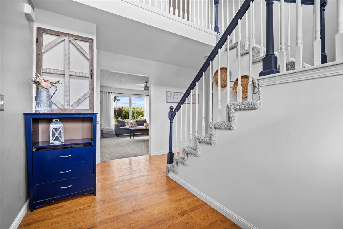 1318 Shannon Road Normal, IL 61761 - Photo 6 of 40 a view of entryway and hall with wooden floor