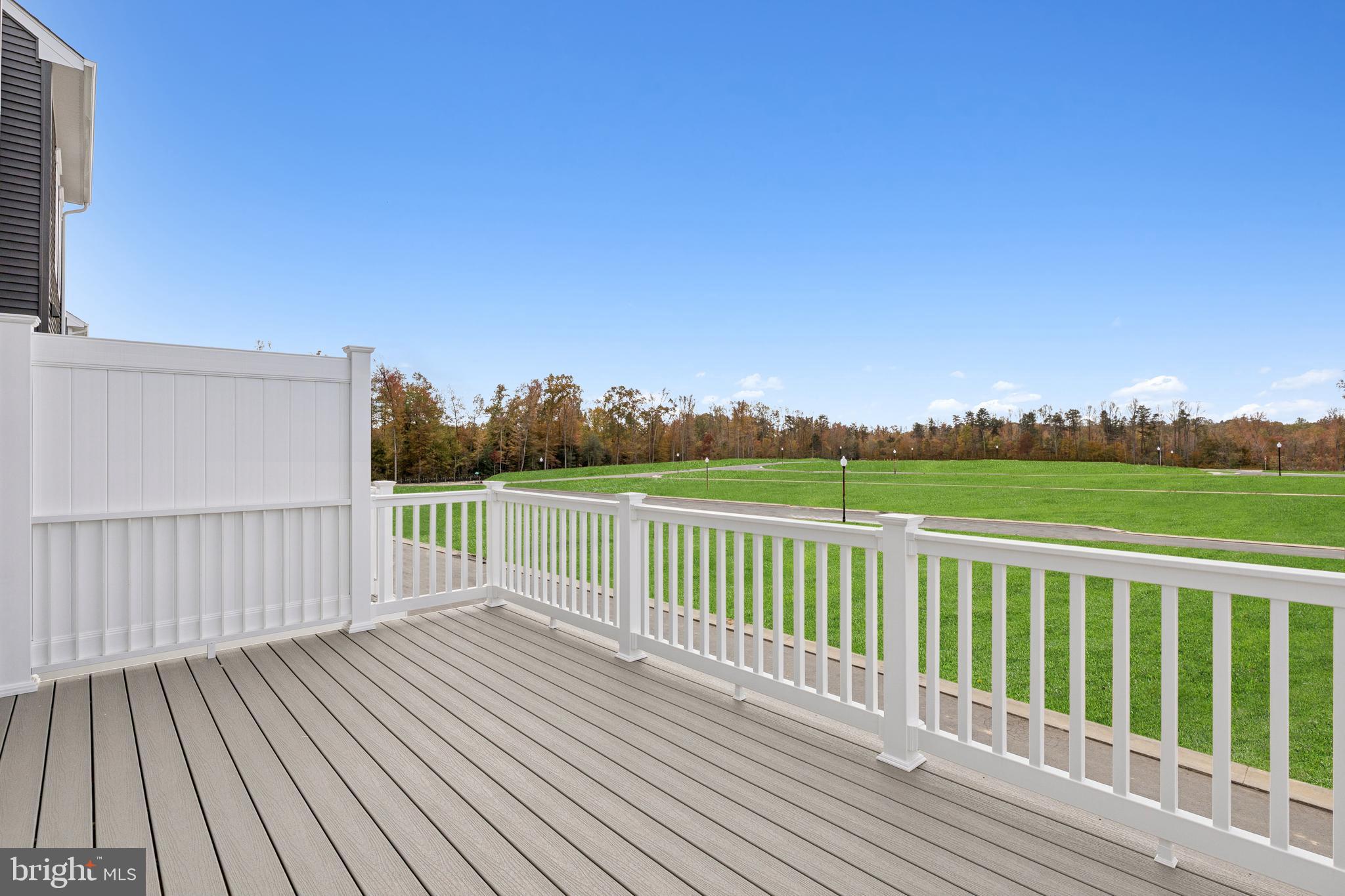 1925 Barolo Boulevard Hanover, MD 21076 - Photo 36 of 37 a view of balcony with wooden floor and fence
